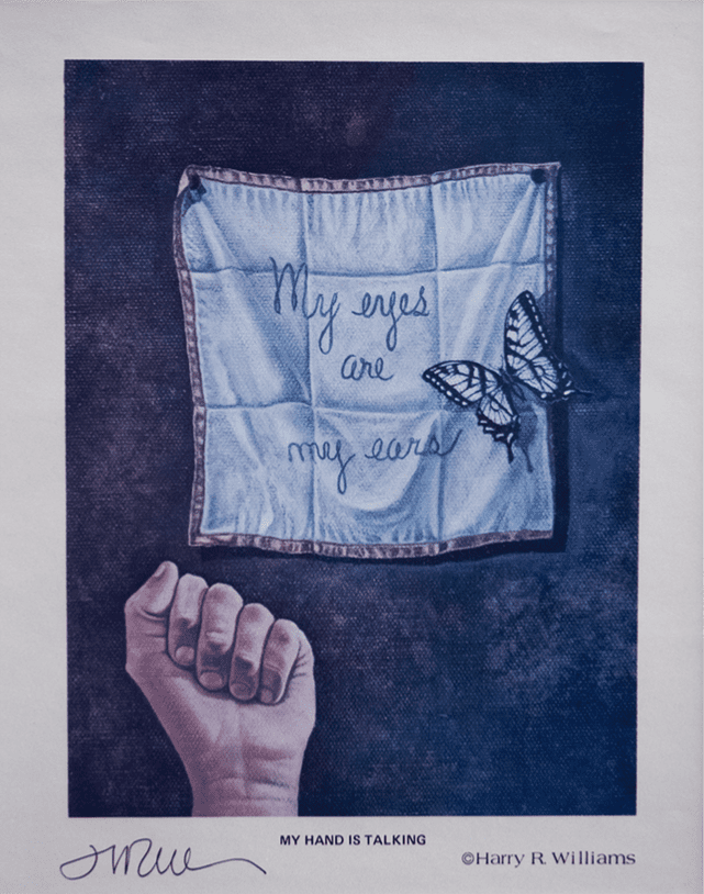 An oil on canvas painting depicts a human hand closed in a fist with a cloth above it that reads "My eyes are my ears." A butterfly rests on the cloth.